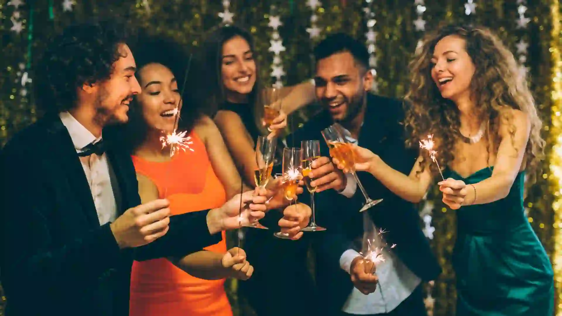 Happy friends celebrating the New Year.