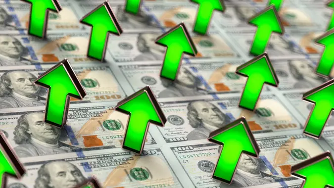 US Dollar Up Trend with Green Arrows.