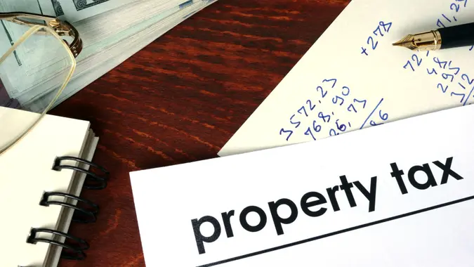 Property tax written on a paper.