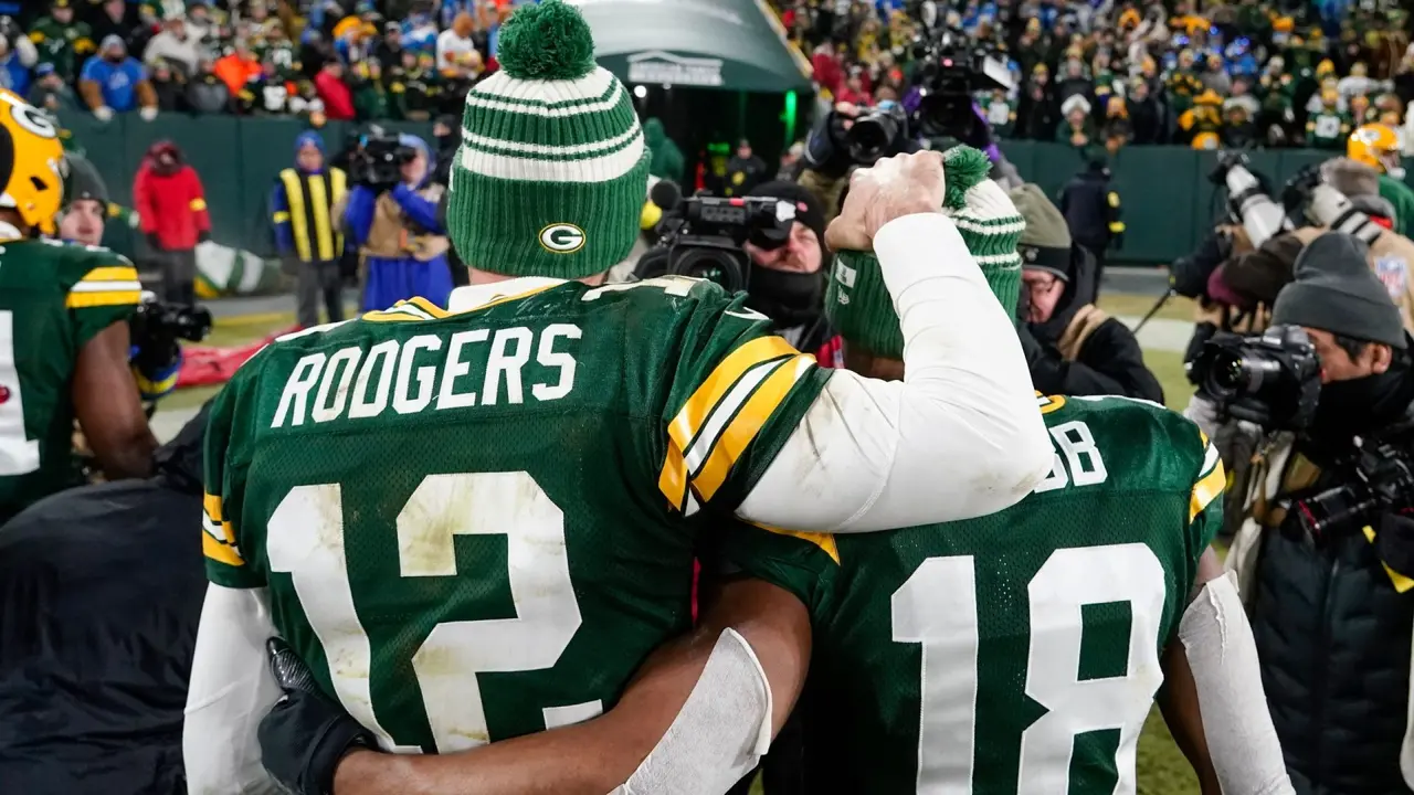 Mandatory Credit: Photo by Morry Gash/AP/Shutterstock (13702690eh)Green Bay Packers' Aaron Rodgers walks off the field with Randall Cobb after an NFL football game against the Detroit Lions, in Green Bay, WisLions Packers Football, Green Bay, United States - 08 Jan 2023.