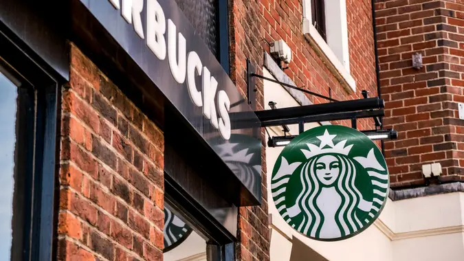 Epsom London UK, March21 2021, Starbucks Coffee Shop Branding Logo With No People.