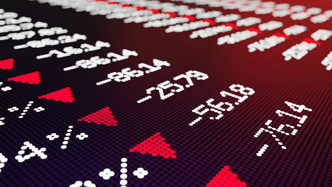 Trading board graph chart which shows a stock market crash with selective focus.