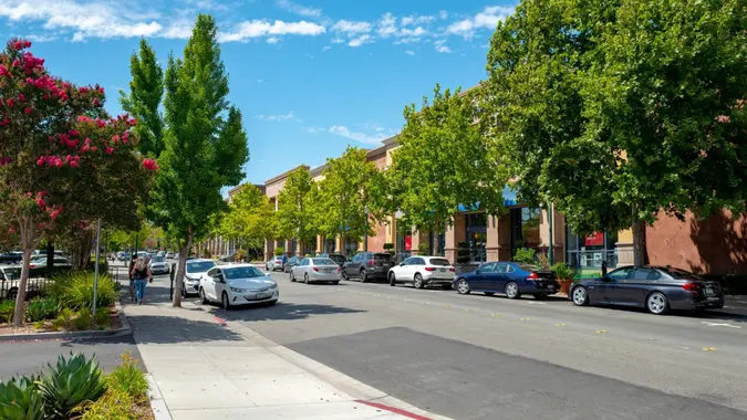 Walnut Creek, California, United States - August 28, 2019:  Cars are visible on a sunny day along a road in downtown Walnut Creek, California, August 28, 2019.
