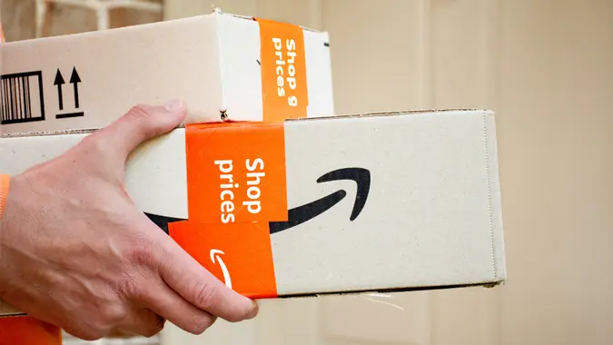 Amazon prime boxes delivered to a front door of residential building. stock photo
