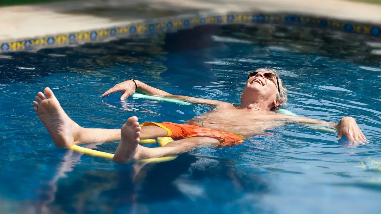 Men relaxed in the pool stock photo