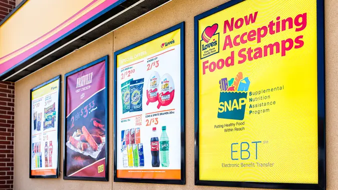 Sikeston, USA - October 16, 2019: Love's gas station and sign on building exterior entrance in Missouri with convenience store closeup for food stamps.