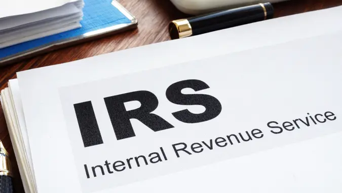 IRS Internal Revenue Service documents and folder.