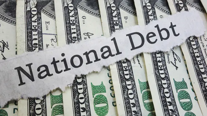 National Debt news headline on cash.