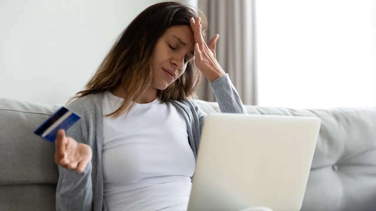 Woman feels stressed having access problem to e-banking stock photo