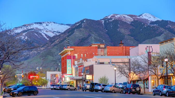 Logan, Utah, USA - April 26, 2019: Evening view of storefronts along W Center St in the downtown business district.