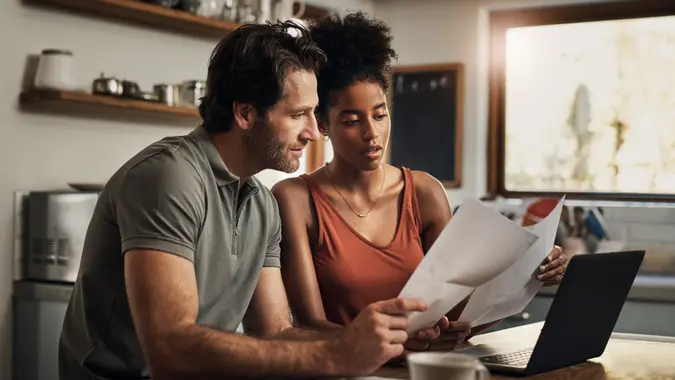 Couple looking through important papers