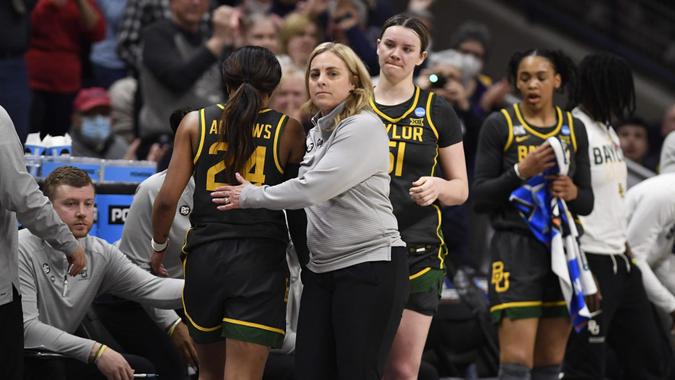 Mandatory Credit: Photo by Jessica Hill/AP/Shutterstock (13836211k)Baylor head coach Nicki Collen, center front, embraces Baylor's Sarah Andrews (24) who comes off the court in the second half of a second-round college basketball game against UConn in the NCAA Tournament, in Storrs, ConnNCAA Baylor UConn Basketball, Storrs, United States - 20 Mar 2023.