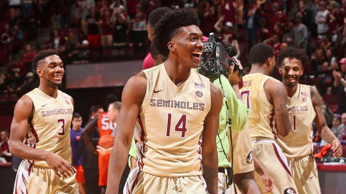 Mandatory Credit: Photo by AP/Shutterstock (8524896ab)Trent Forrest, Terance Mann, Phil Cofer, Braian Angola-Rodas Florida State guards Trent Forrest (3) and Terance Mann (14), and forward Phil Cofer (0) and guard Braian Angola-Rodas (11) celebrate after an NCAA college basketball game against Clemson in Tallahassee, Fla.