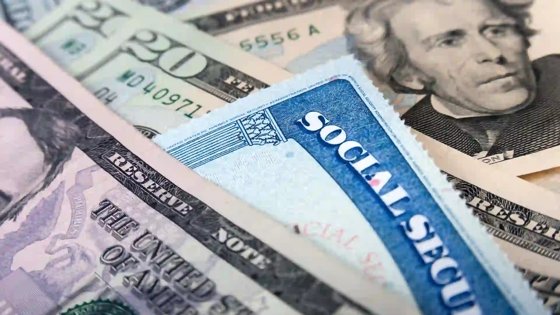 Social security card and American money dollar bills stock photo