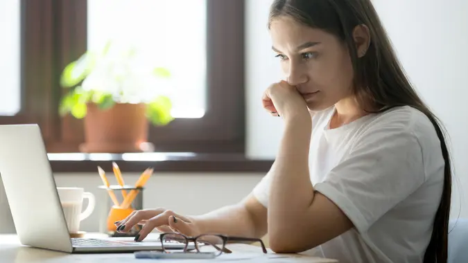 Concerned female thinking of problem solution stock photo