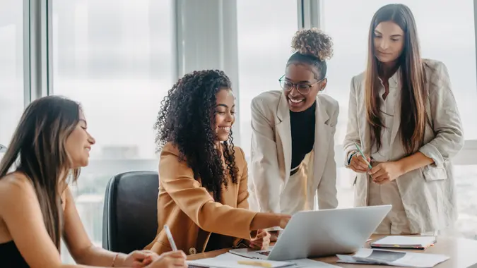 women engaged in solving problems.