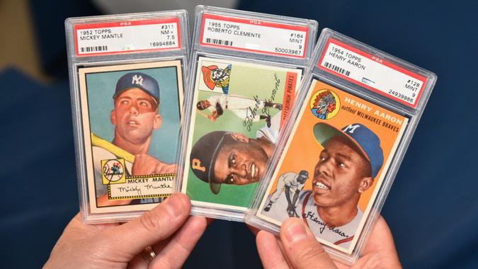 Mandatory Credit: Photo by Erik Pendzich/Shutterstock (5967104h)Goldin Auctions displays some of it's most valued sports cards up for auction, including a 1952 Topps Mickey Mantle card, a 1955 Topps Roberto Clemente card and a 1954 Topps Hank Arron rookie card.