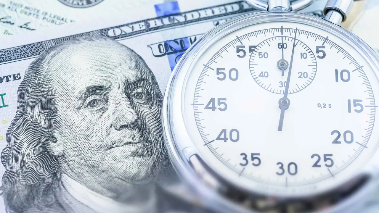 Time is money, value of asset growth over time, financial concept : US USD dollar with a stopwatch, depicting investors deposit or invest for future income or increasing profit in high yield bonds.