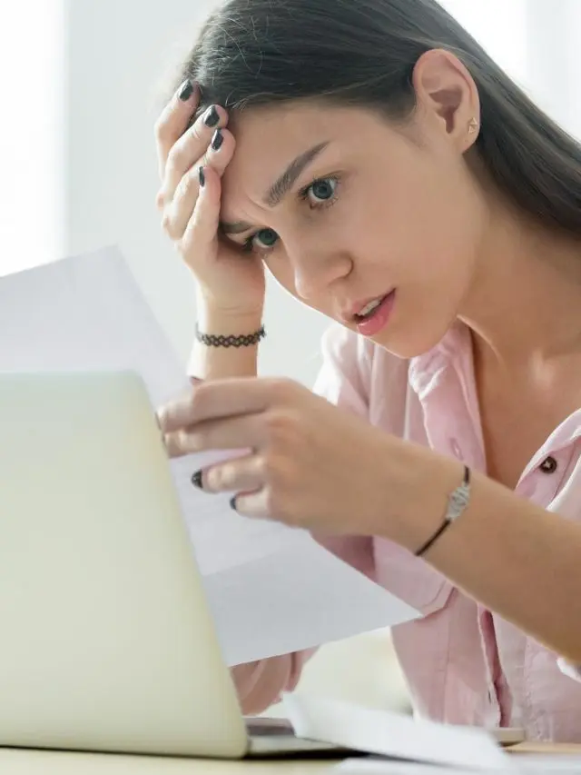 cropped-stressed-girl-student-paperwork-laptop_iStock-963814290.jpg