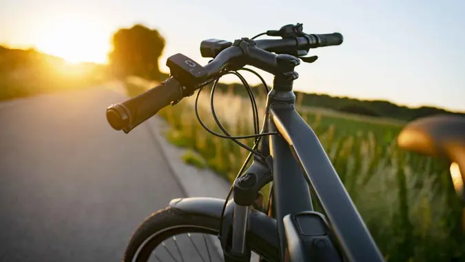 E-bike on the country road at sunset.