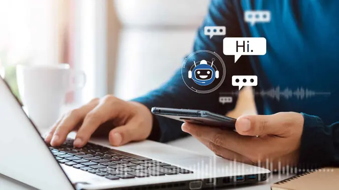 AI Chatbot intelligent digital customer service application concept, computer mobile application uses artificial intelligence chatbots automatically respond online messages to help customers instantly.