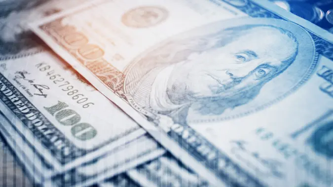 Dollar bills and finance and banking on digital stock market financial exchange stock photo
