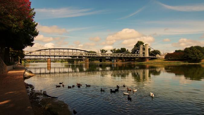 The 140 year old suspension bridge over the Brazos River near downtown Waco Texas.