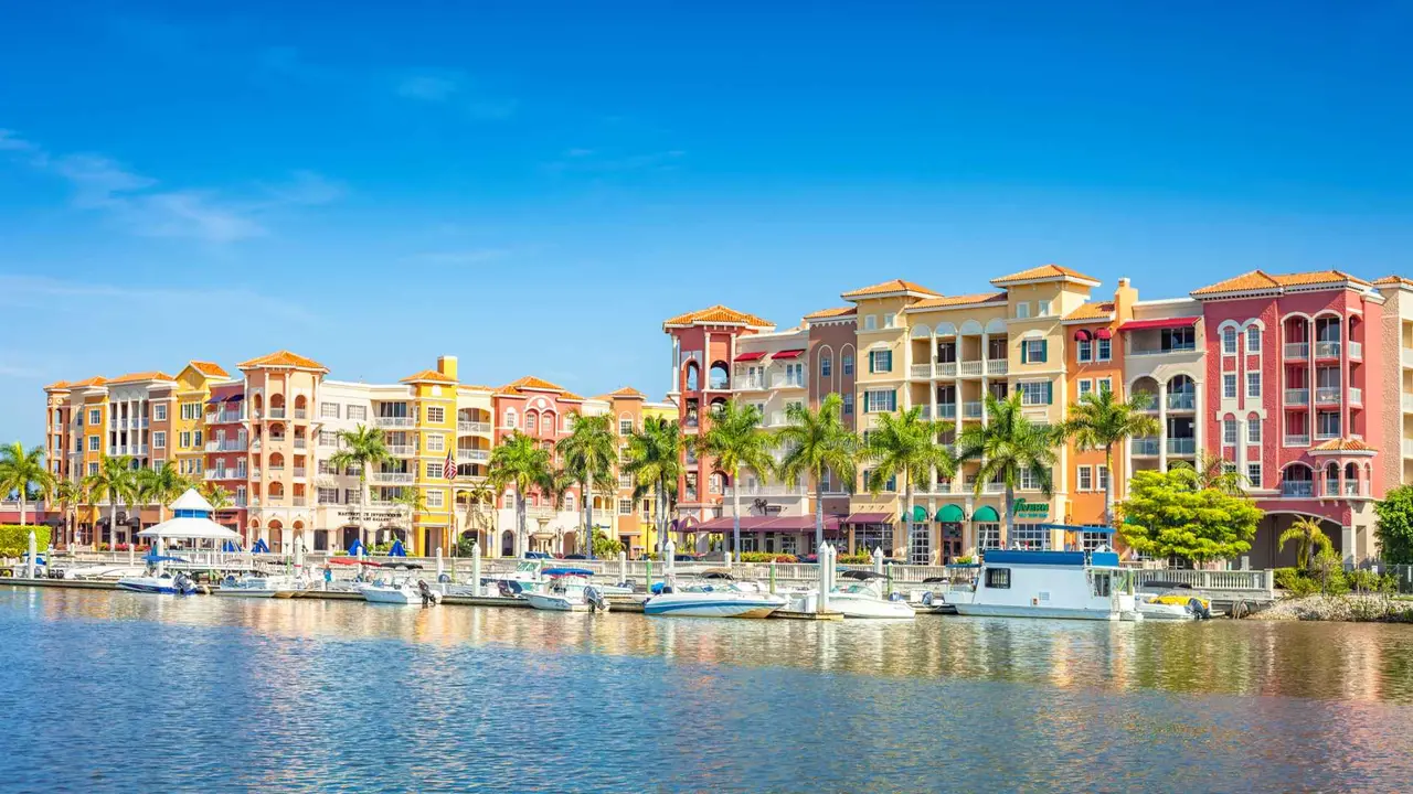 Condos and marina in Naples, Florida, USA on a sunny day.