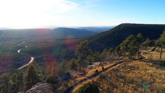 The highway snakes along at the bottom of the mogollon rim.