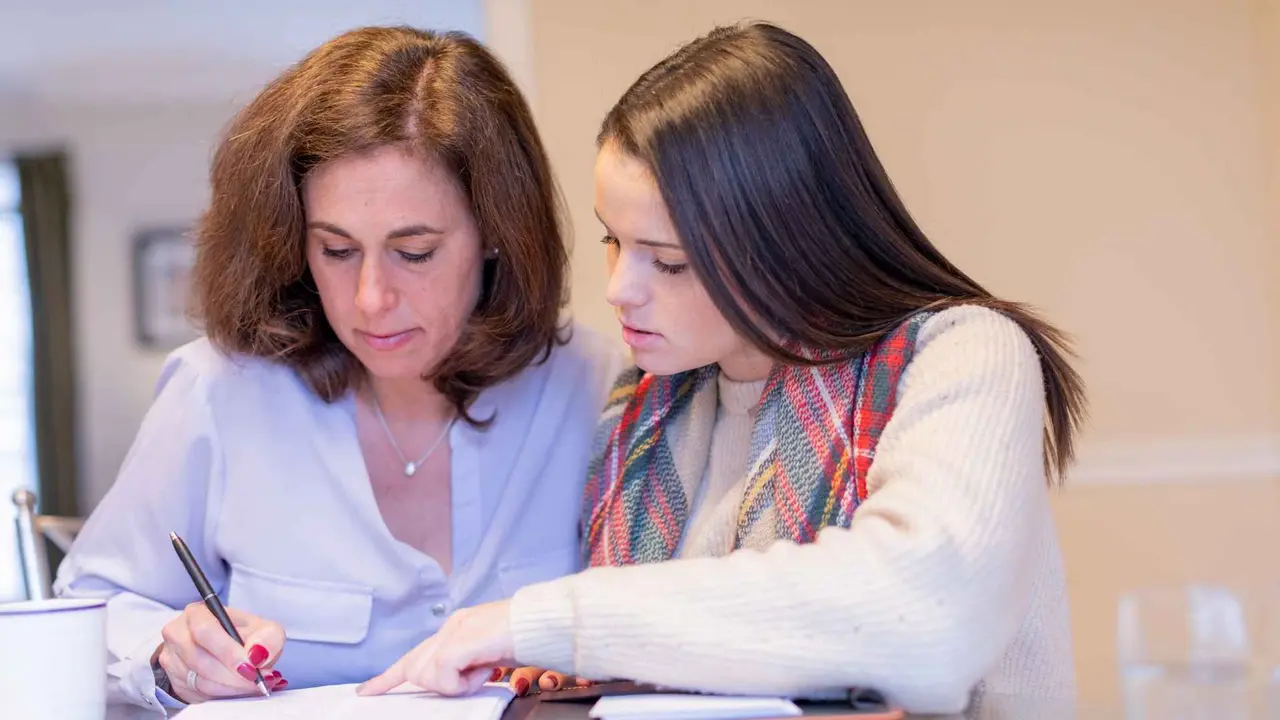 Young financial advisor visiting retirement home.