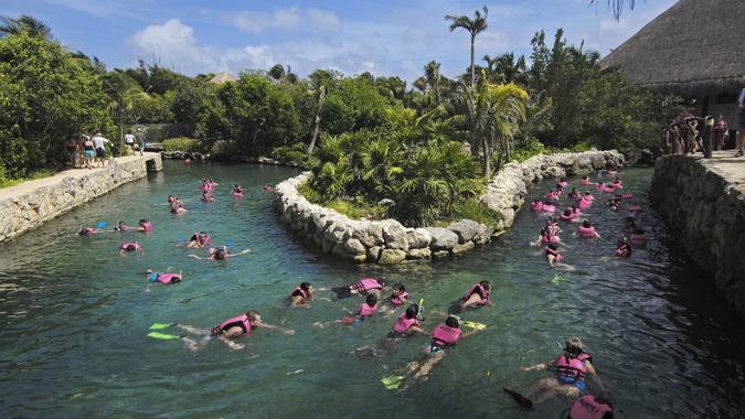 Mandatory Credit: Photo by imageBROKER/Shutterstock (1858235a)People swimming in the underground River, Xcaret, Eco-archeological park, Playa del Carmen, Quintana Roo state, Mayan Riviera, Yucatan Peninsula, MexicoVARIOUS.