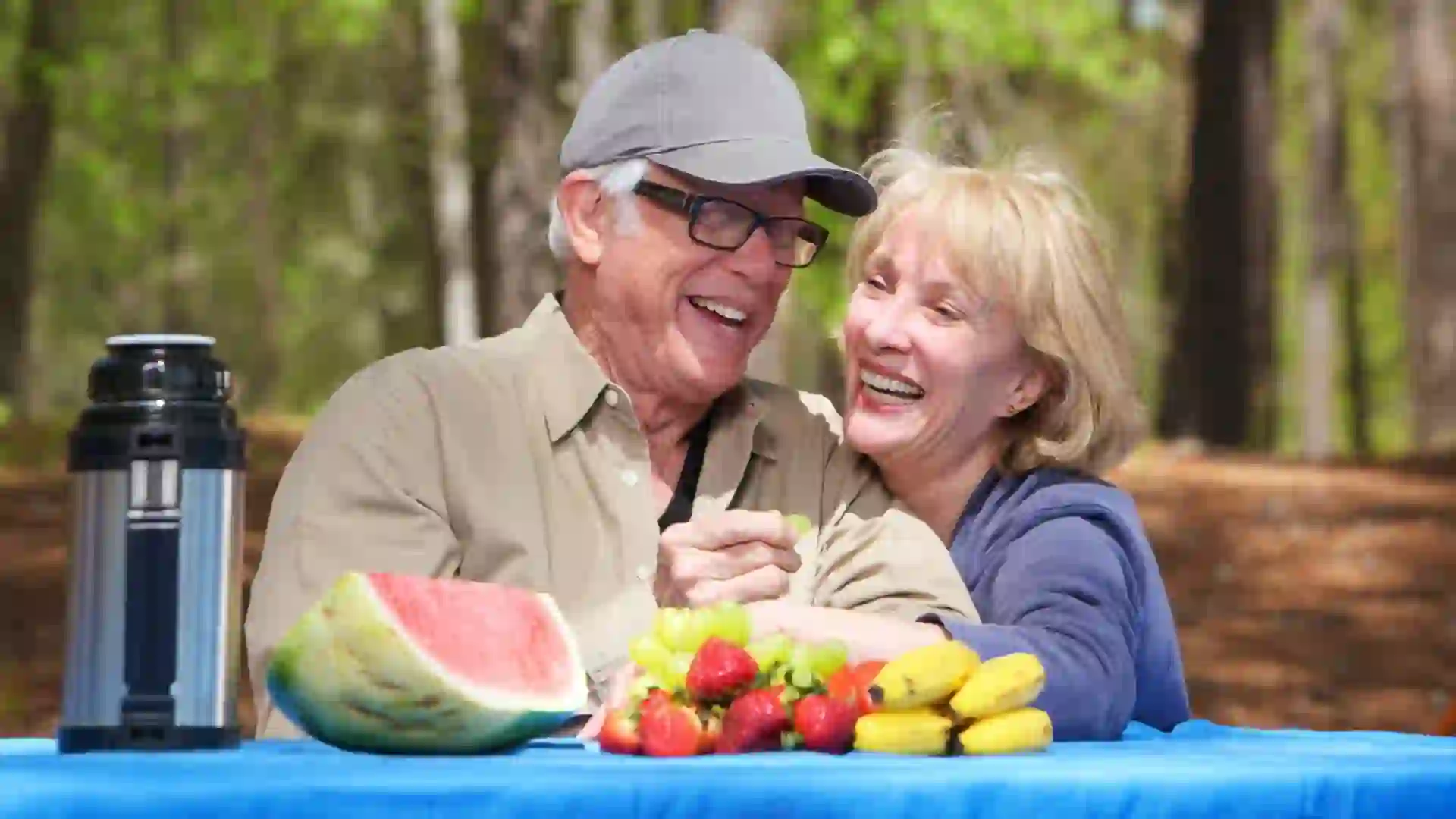 Senior couple in the park stock photo