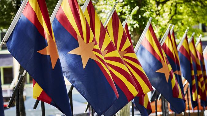 A Row of Arizona State Flags stock photo