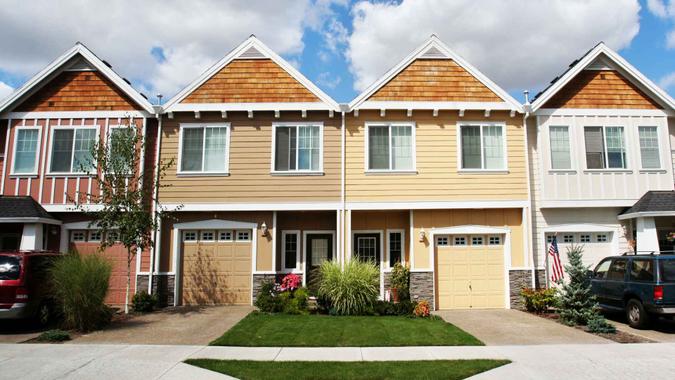 Outdoors, Day, Nobody, Curb, Front Door, Man Made Structure, Residential District, New, Residential Structure, House, Real Estate, Beautiful, Building Exterior, Built Structure, Roof, Window, Facade, Door, Architecture, Green, Sidewalk, USA, Blue, Sky, Sunlight, Cloud, Multi Colored, Driveway, Car, Yellow, White, Beige, Grass, Flower, Plant