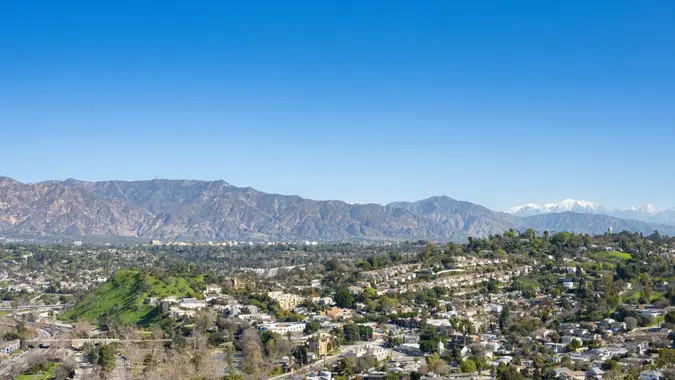 Pasadena and South Pasadena with San Gabriel Mountains in the background and Arroyo Parkway in the foreground.