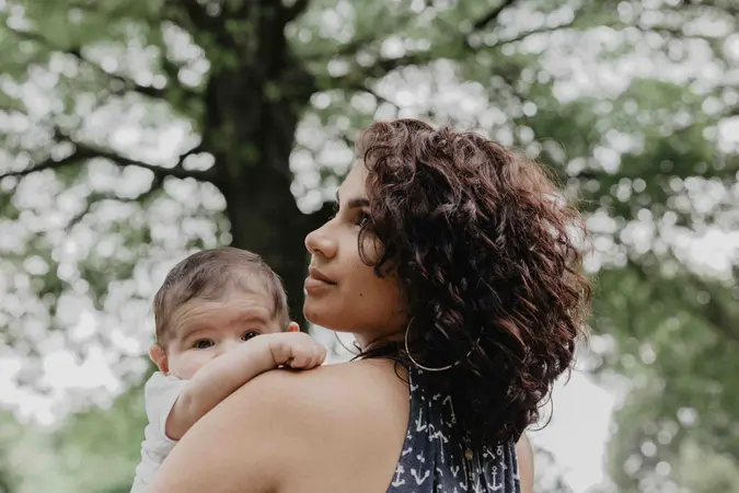 A new mom holding her baby