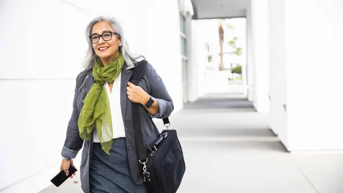 A senior hispanic businesswoman at the conference center.