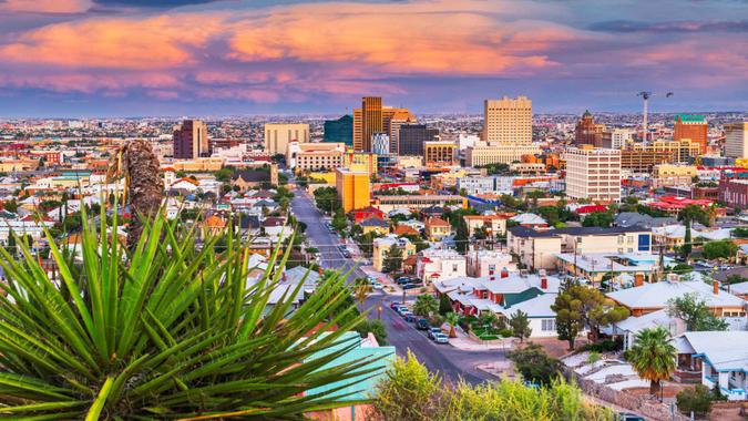 El Paso, Texas, USA  downtown city skyline at dusk with Juarez, Mexico in the distance.