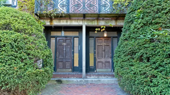 Front doors of duplex home along Main street in Bradford - Haverhill Massachusetts, September 2022.