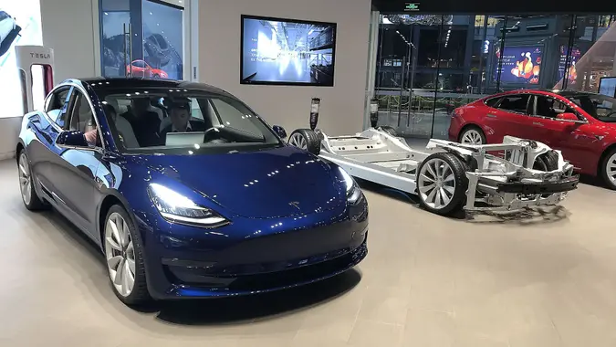 Mandatory Credit: Photo by Stephen Shaver/UPI/Shutterstock (12419061c)Chinese visit Tesla's new showroom in Beijing on February 25, 2019.