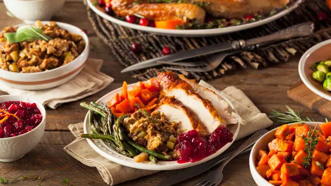 Full Homemade Thanksgiving Dinner with Turkey Stuffing Veggies and Potatos.