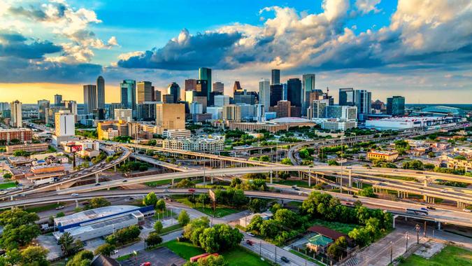 The skyline of Houston, Texas at sunset shot from an altitude of about 600 feet .