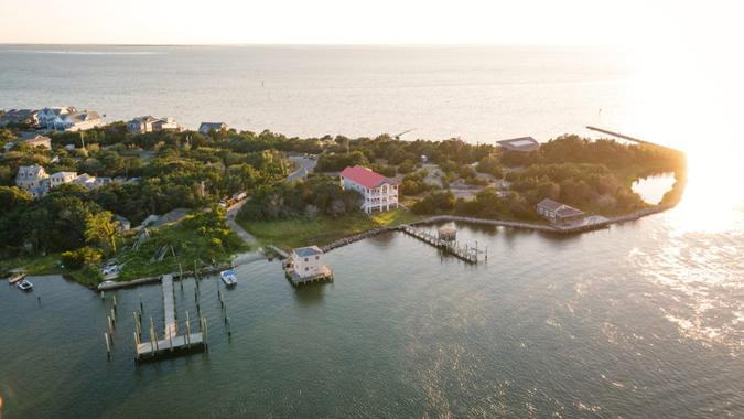 Aerial view of Silver Lake harbor and Ocracoke village on Ocracoke Island, North Carolina at golden hour.