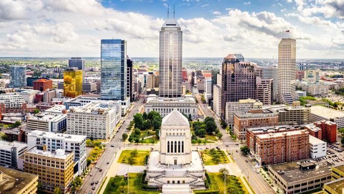 Aerial view of Indianapolis, Indiana skyline above Indiana World War Memorial and University park, and along Meridian and Pennsylvania streets.