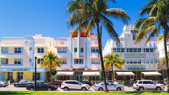 Miami Beach, Ocean Drive with row of hotels.