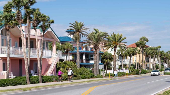 Destin, USA - April 24, 2018: Miramar beach city town village with colorful multicolored yellow beachfront houses in Florida panhandle gulf of mexico, coast highway road street.