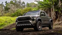 Here’s What It Costs To Charge a Tesla Monthly vs. Using Gas for a Toyota Tacoma