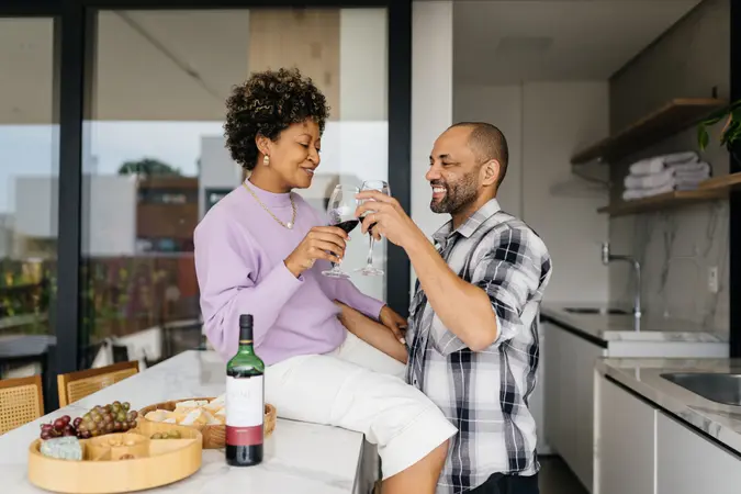 African American couple celebrating Valentine's Day at home.