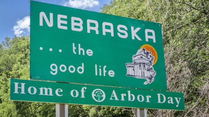 Plattsmouth, NE, USA - July 13, 2014: Nebraska, the good life, home of Arbor Day - roadside welcome sign at state border.