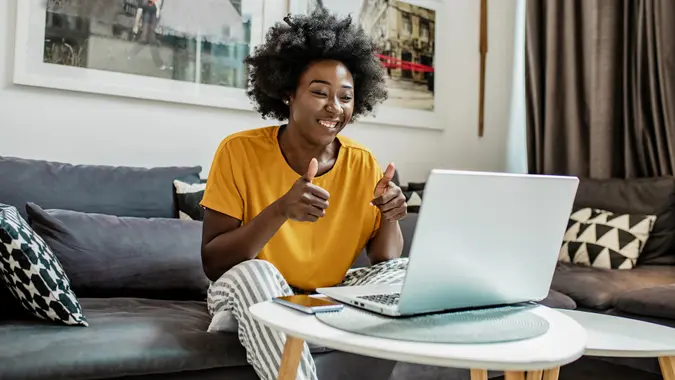 Relaxed African American is working from home stock photo